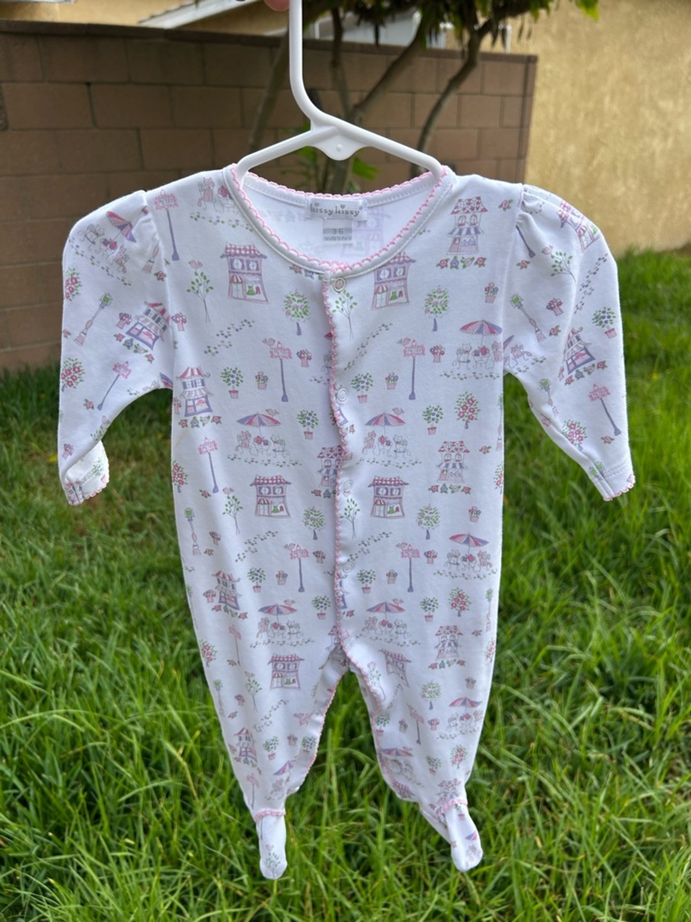 Kissy Kissy White Footed One-Piece with Pink Village Print